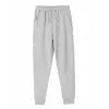 Спортивні штани для хлопчика світло-сірі з резинками знизу YU.02.24.001 Спортивні штани для хлопчика світло-сірі з резинками знизу YU.02.24.001