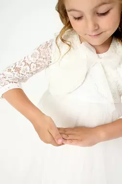 Болеро для дівчинки з мереживними рукавами біле YJ.21.30.014 Болеро для дівчинки з мереживними рукавами біле YJ.21.30.014